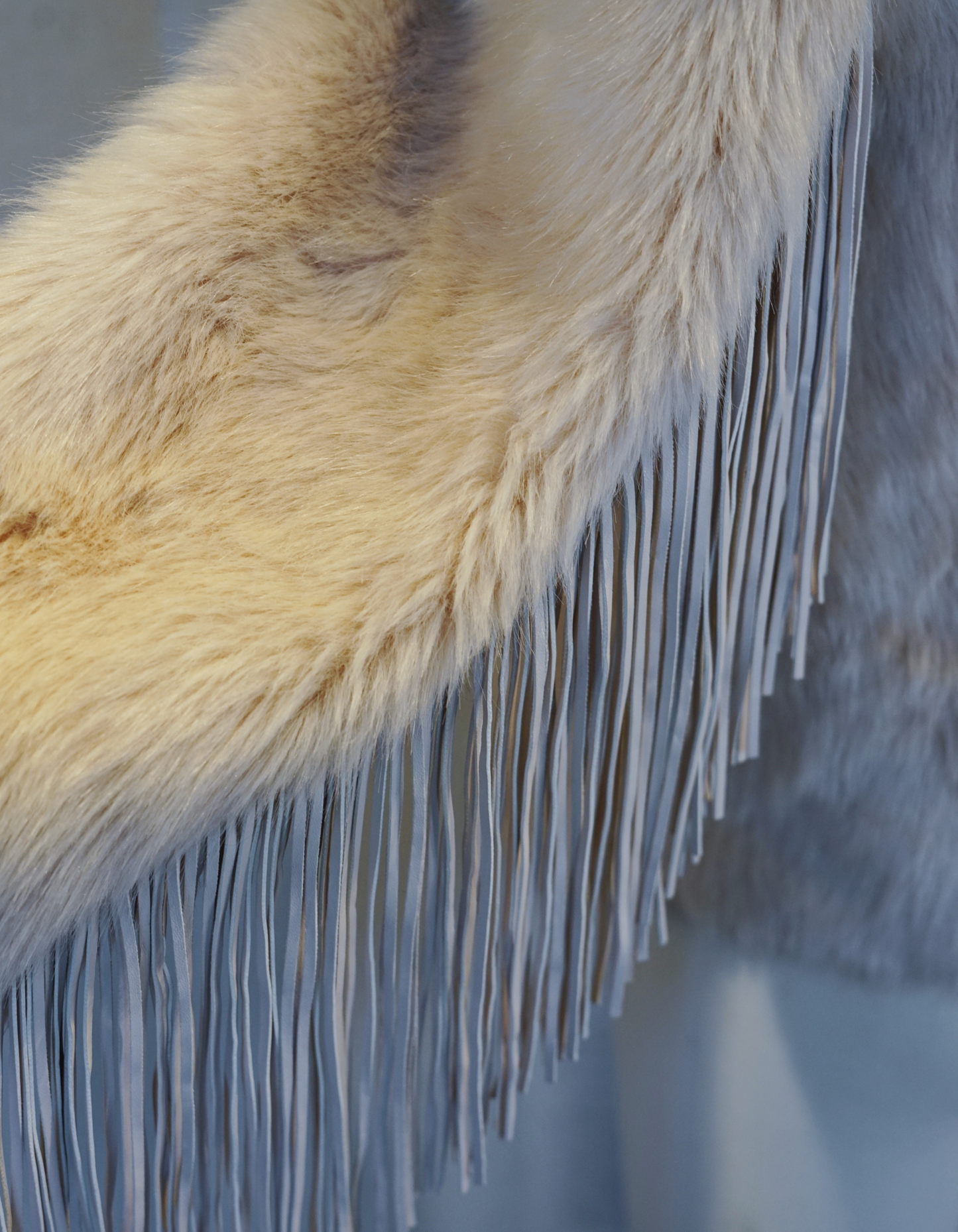 Beige Fur Coat with Leather Fringe Sleeves and Snap Closure